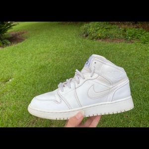 All white Jordan 1 Mids retro